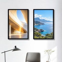 Hai tranh điện viền đen treo trên bàn làm việc trong bối cảnh văn phòng